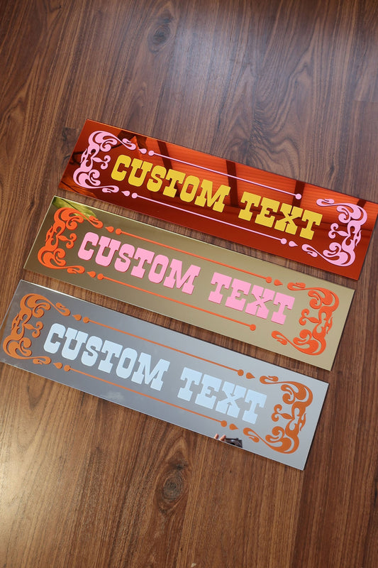 Three rectangular signs with the text "CUSTOM TEXT" printed on them, placed on a wooden floor.