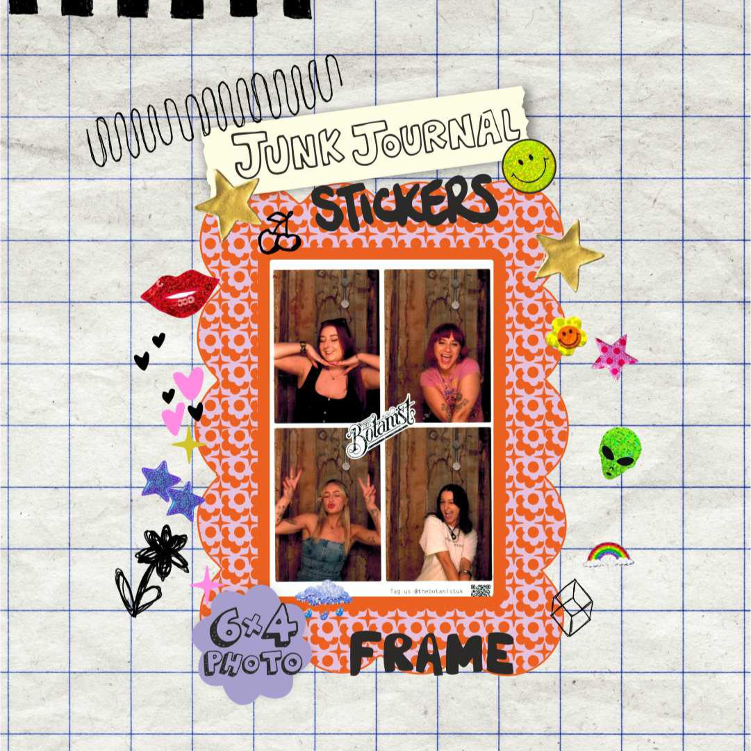 Junk journal with stickers and a photo frame on a grid background