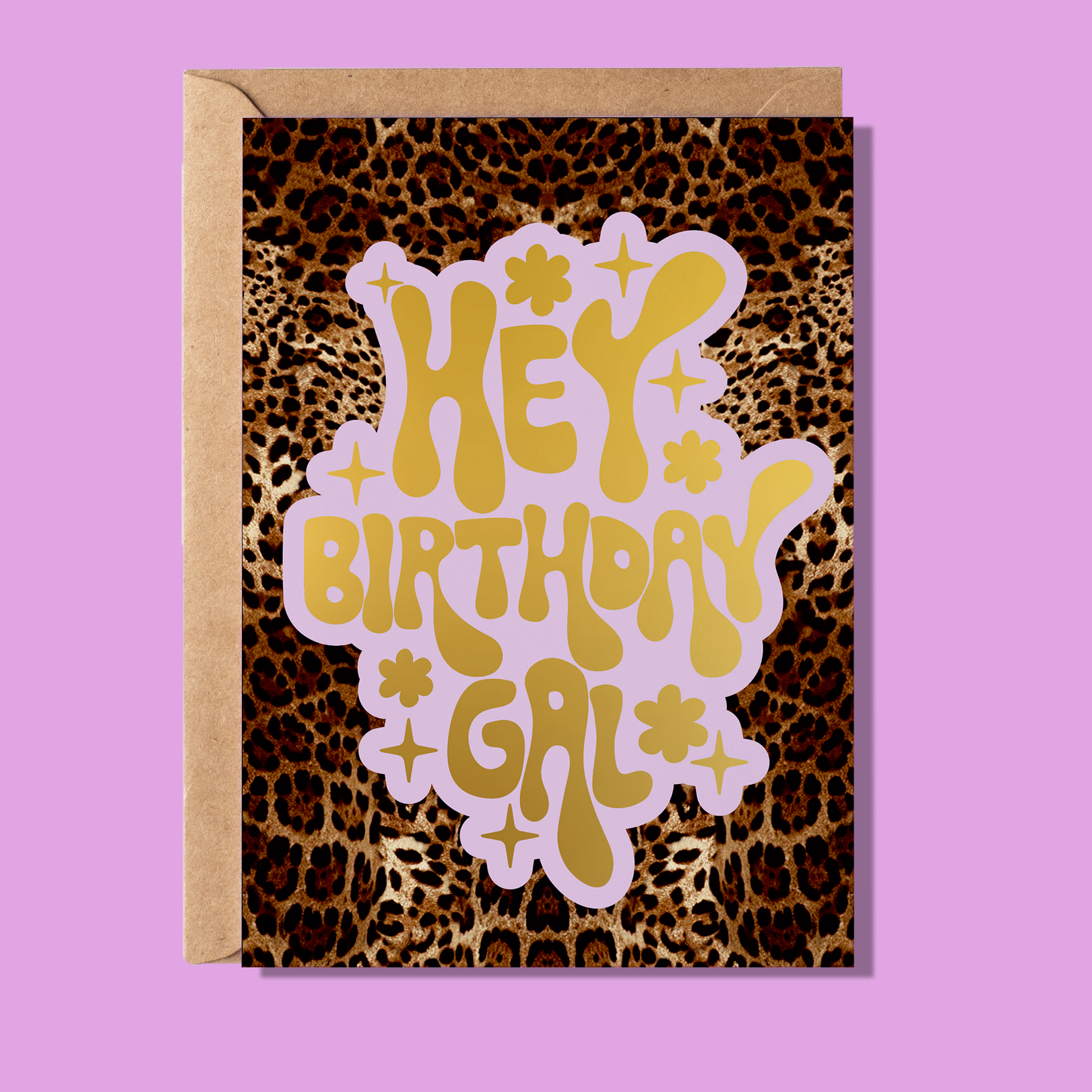 Birthday card with 'Hey Birthday Girl' text on a leopard print background, against a pink background